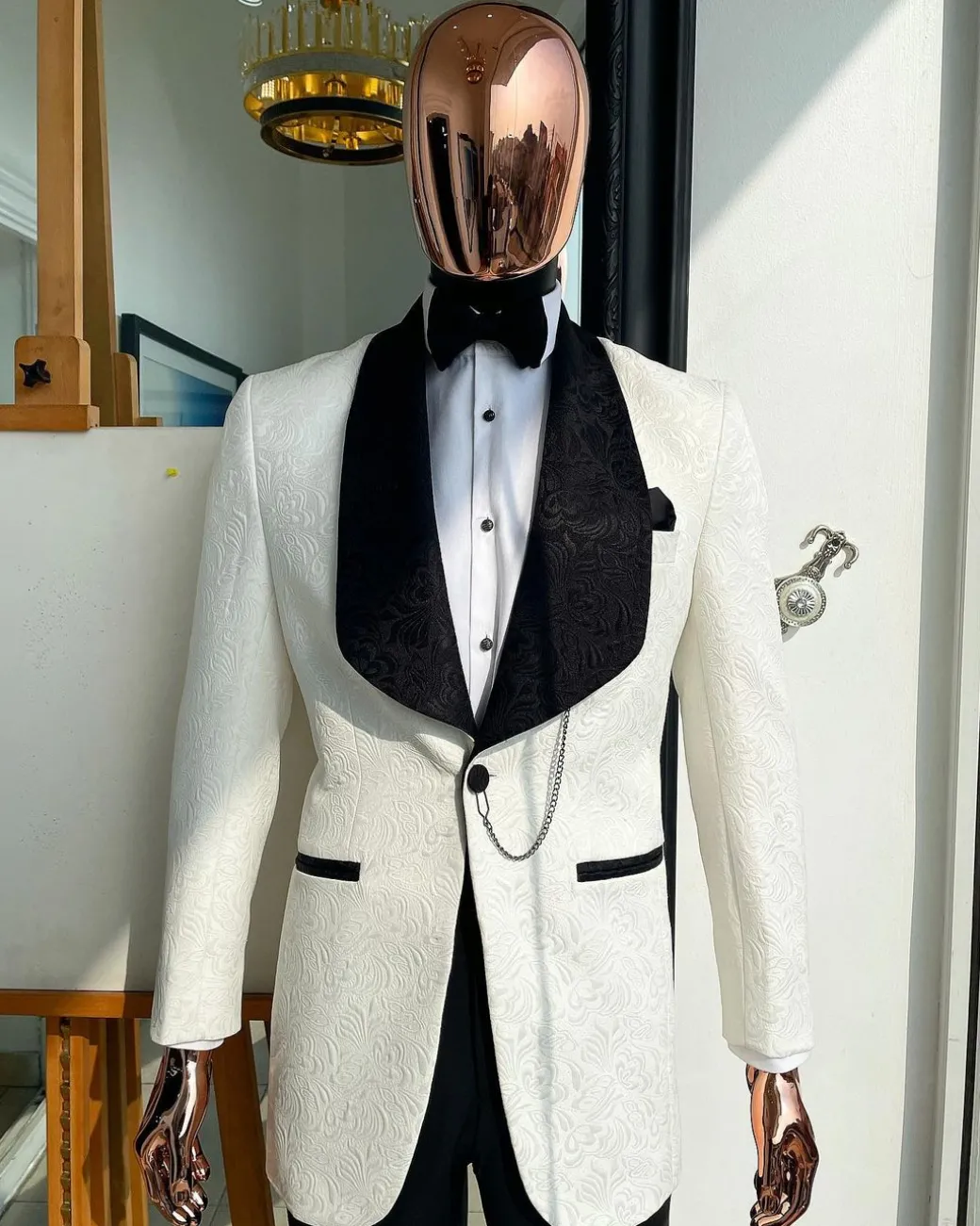 An Ivory White, Black Lapel Floral Pattern Shawl Lapel Tuxedo Suit