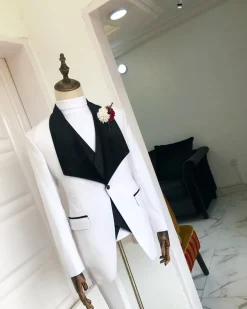 An Ivory White, Black Velvet Lapel tuxedo Suit