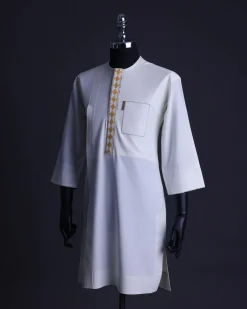 An Ivory White, Connected inverted cube -layered 3D embroidery design with splashed gold ss30 Swarovski stone details Agbada