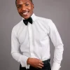 An Ivory white, covered button flap, tuxedo shirt.