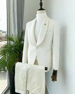 An Ivory White dispersed unequal pattern shawl lapel jacquard texedo suit.