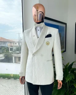 An ivory white Egyptian scritto pattern jacquard shawl lapel single button, double breasted Suit