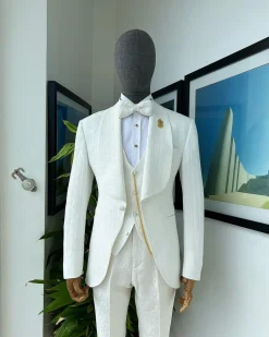 An ivory white, elastic, basket weave layered floral jacquard shawl lapel tuxedo suit.