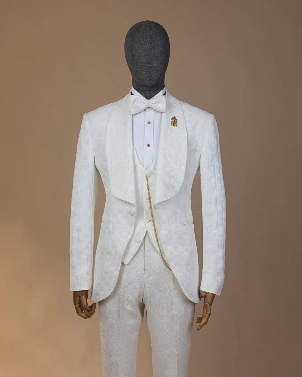 An ivory white, elastic, basket weave layered floral jacquard shawl lapel tuxedo suit.