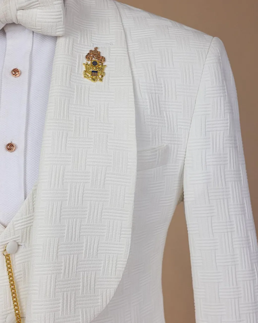 An ivory white, elastic, basket weave layered floral jacquard shawl lapel tuxedo suit.