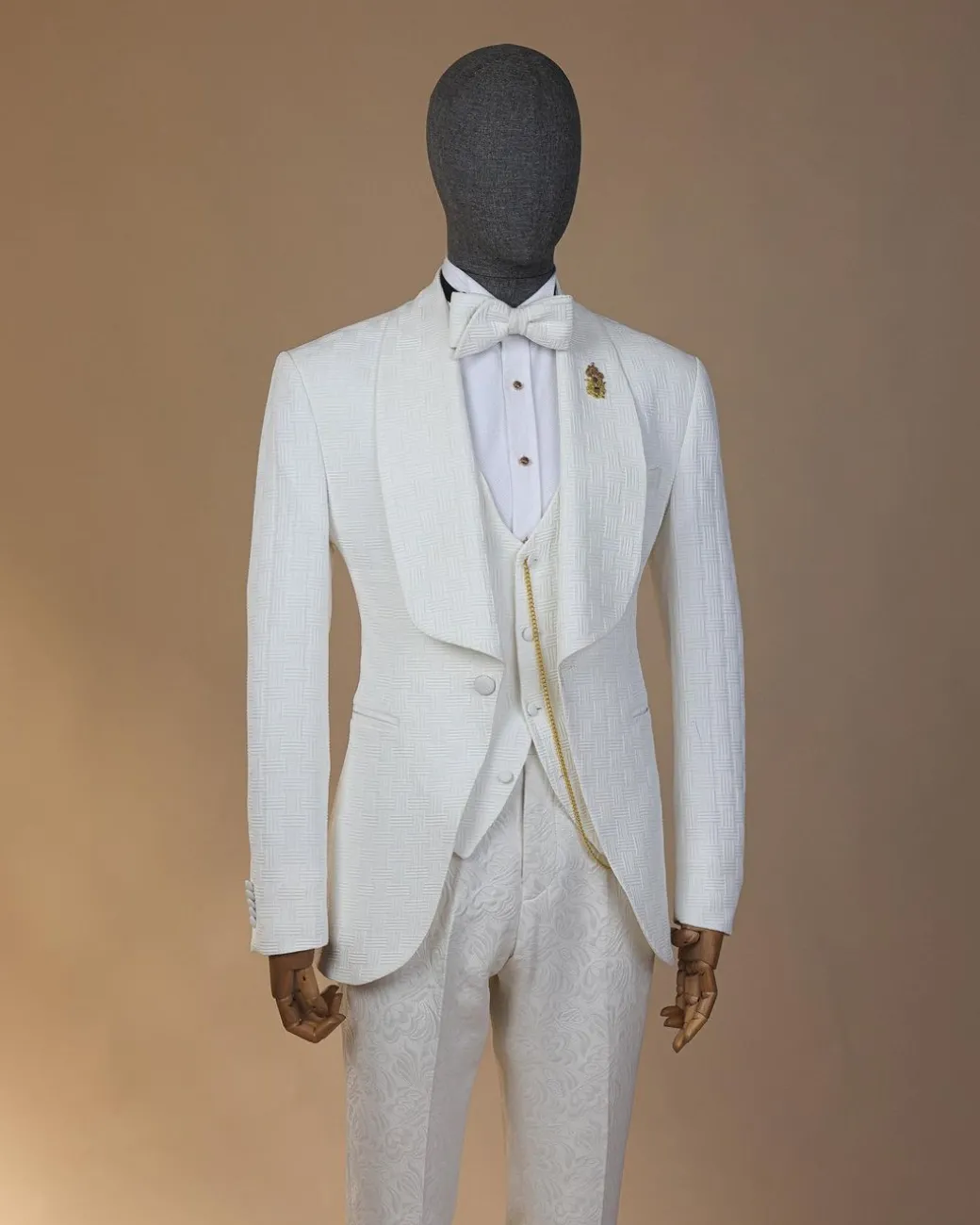 An ivory white, elastic, basket weave layered floral jacquard shawl lapel tuxedo suit.