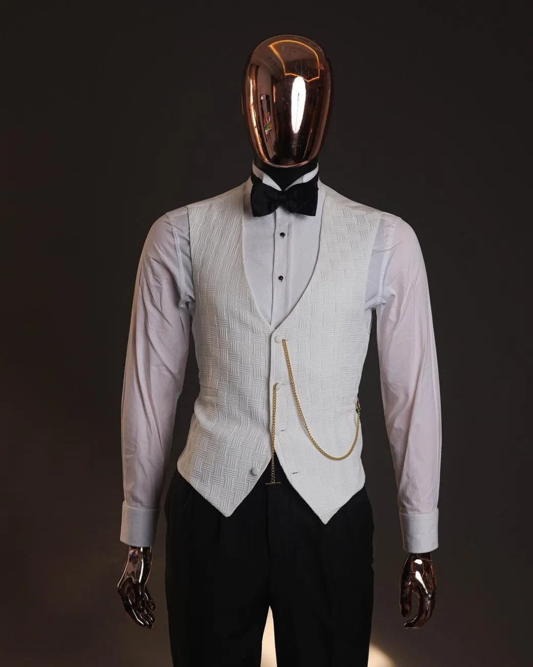 An Ivory white, elastic, basket weave layered floral jacquard shawl lapel tuxedo suit.