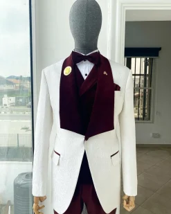 An Ivory white floral pattern jacquard shawl lapel tuxedo suit
