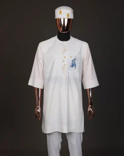 An Ivory white, front flap with dropping star embroidery , 3/4 sleeve African senator kaftan native.