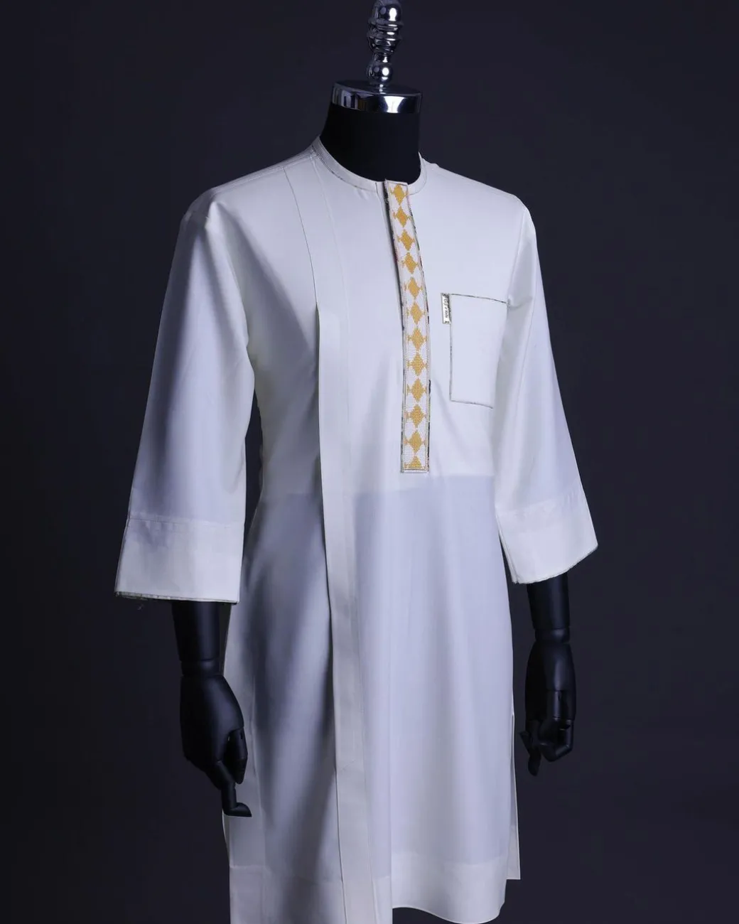 An Ivory White, front flap, patch pocket with gold embroidery detailing African senator kaftan native.