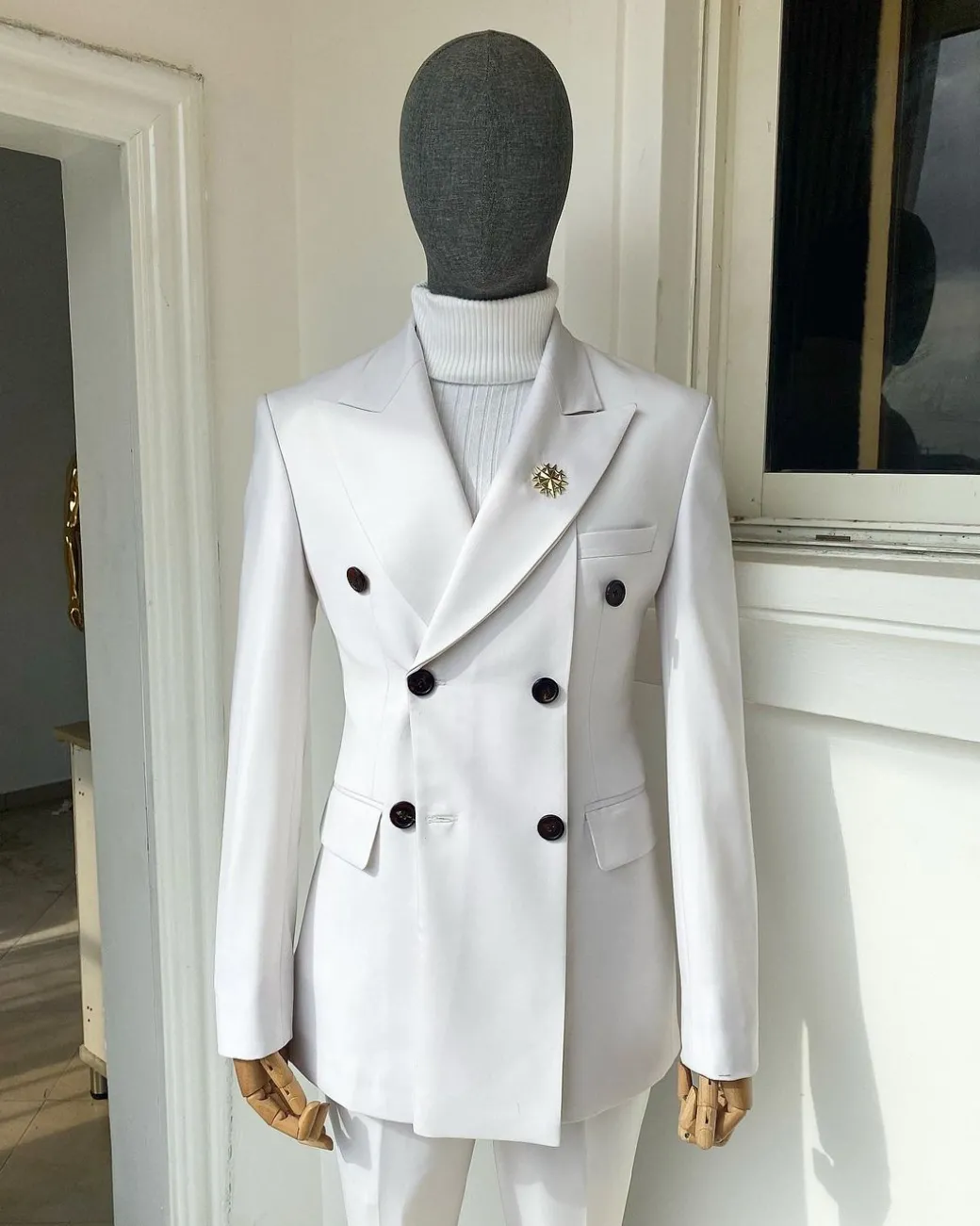 An Ivory White “Hart” Triple Breasted Suit