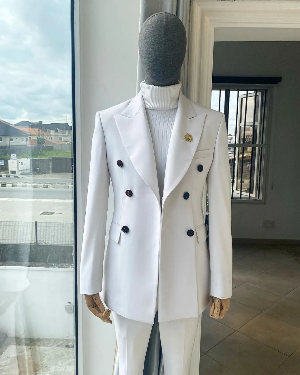 An Ivory White “Hart” Triple Breasted Suit