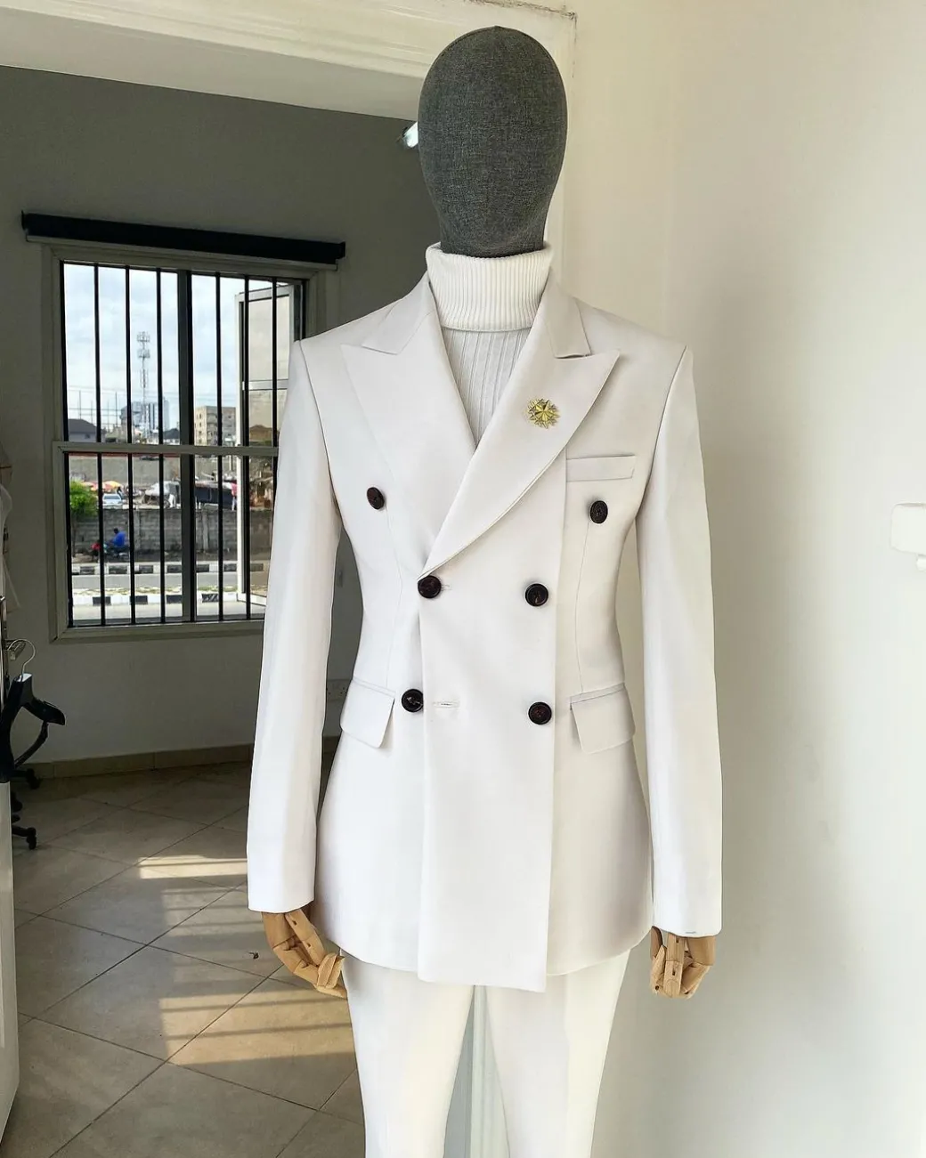 An Ivory White “Hart” Triple Breasted Suit