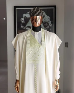 An Ivory White, Jakan And Lines Embroidery Details Agbada, 3/4 Sleeve Kaftan, And Sokoto