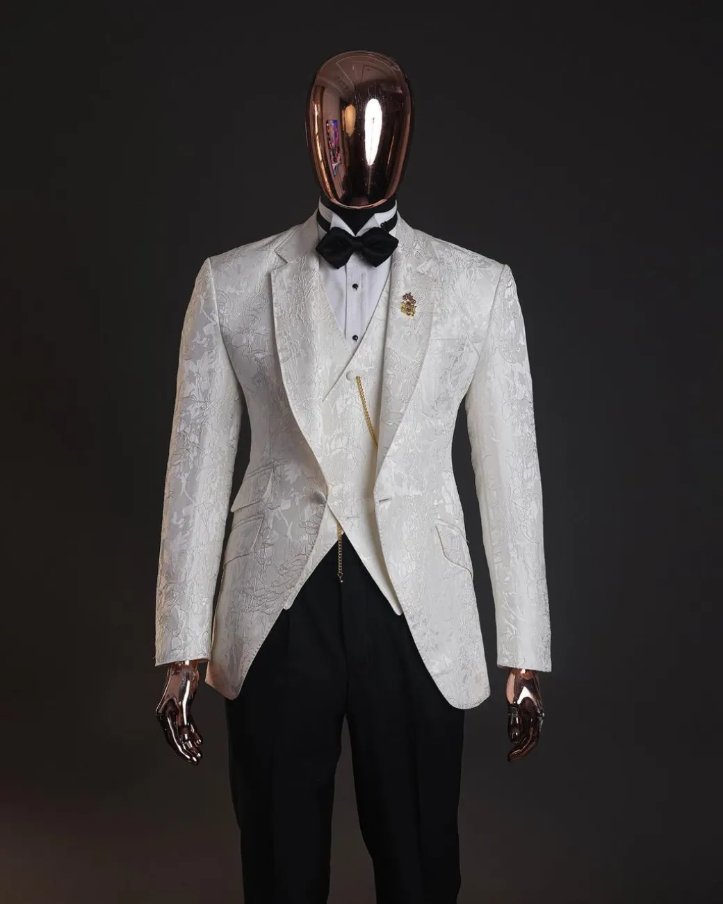 An ivory white, knitted, root floral jacquard notch tuxedo lapel suit
