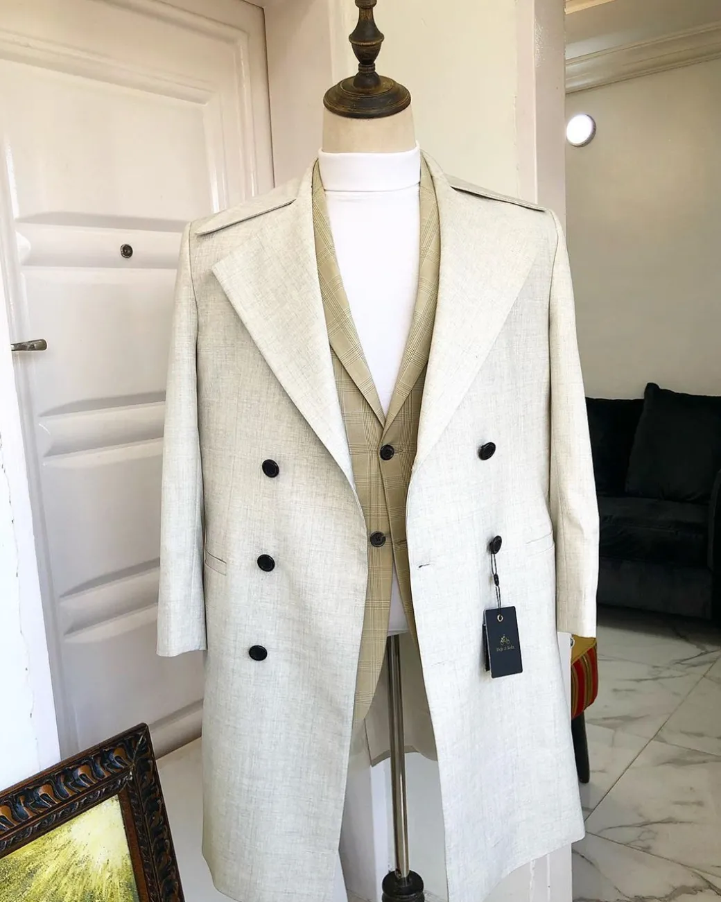 An Ivory White “No Longer At Ease” Suit