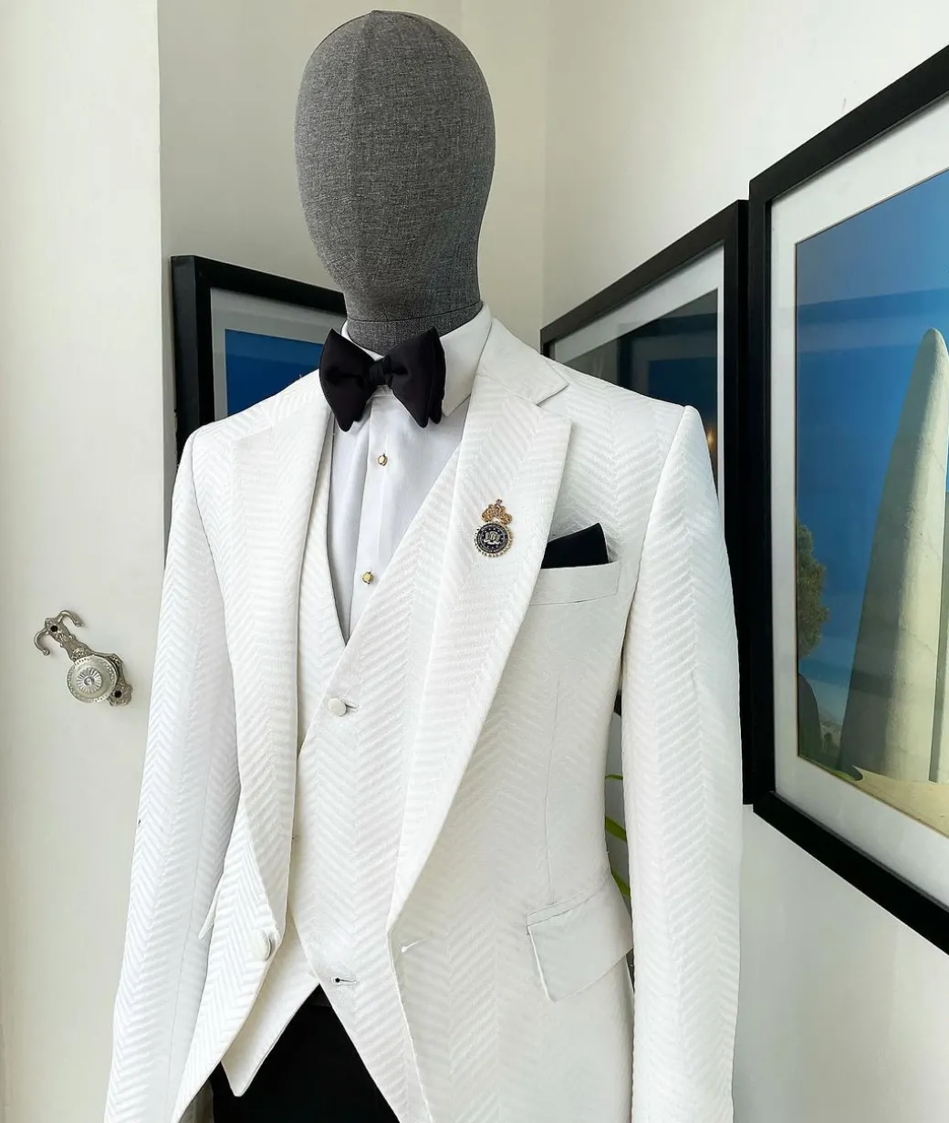 An Ivory white, notch lapel, infinity “maze” line Japanese patterned jacquard suit.