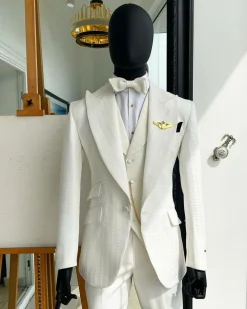 An Ivory White, Peak Lapel, Infinity Line And Square Patterned Jacquard Suit