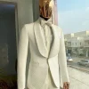 An Ivory white reloaded “Road To Damascus” monochrome square pattern jacquard tuxedo suit.