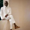 An Ivory White Shawl and peak lapel Tuxedo suit