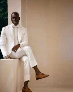 An Ivory White Shawl and peak lapel Tuxedo suit