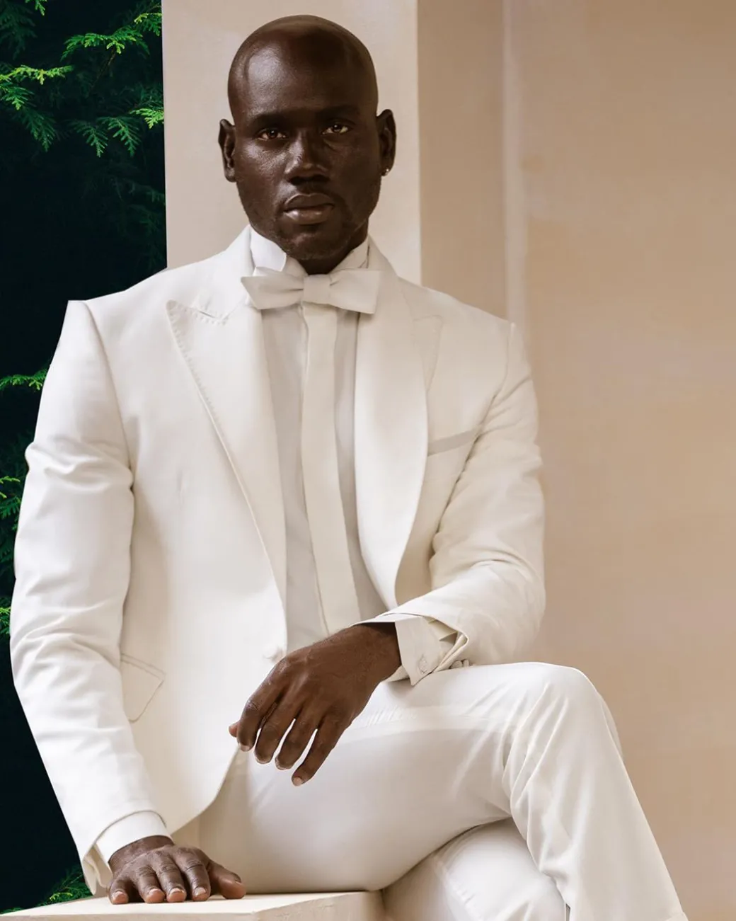 An Ivory White Shawl and peak lapel Tuxedo suit