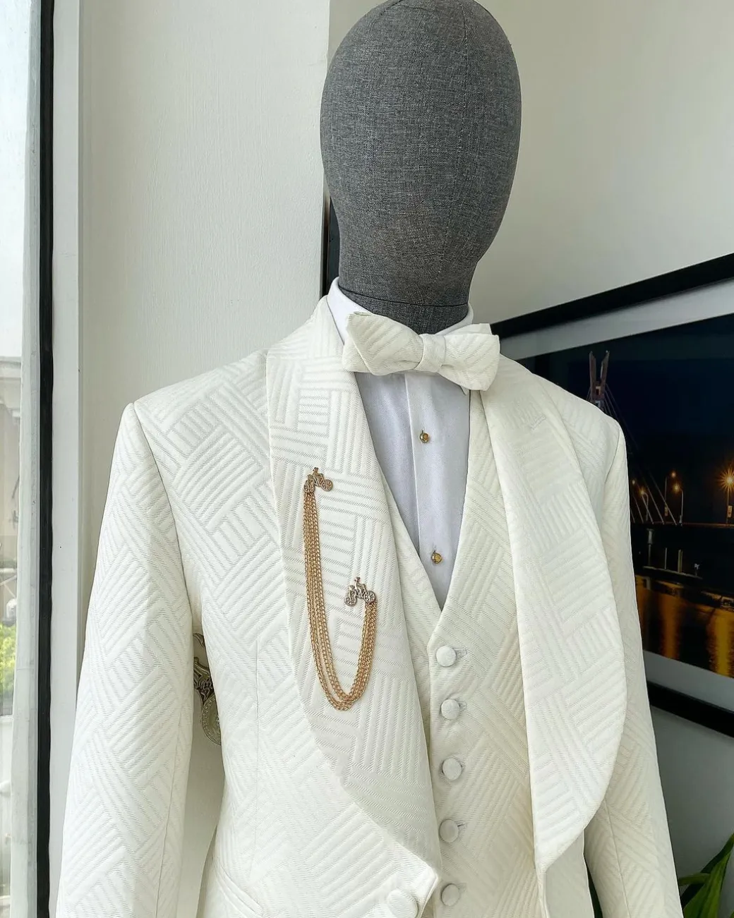 An ivory white, shawl lapel, “maze” line intersection Japanese patterned jacquard suit