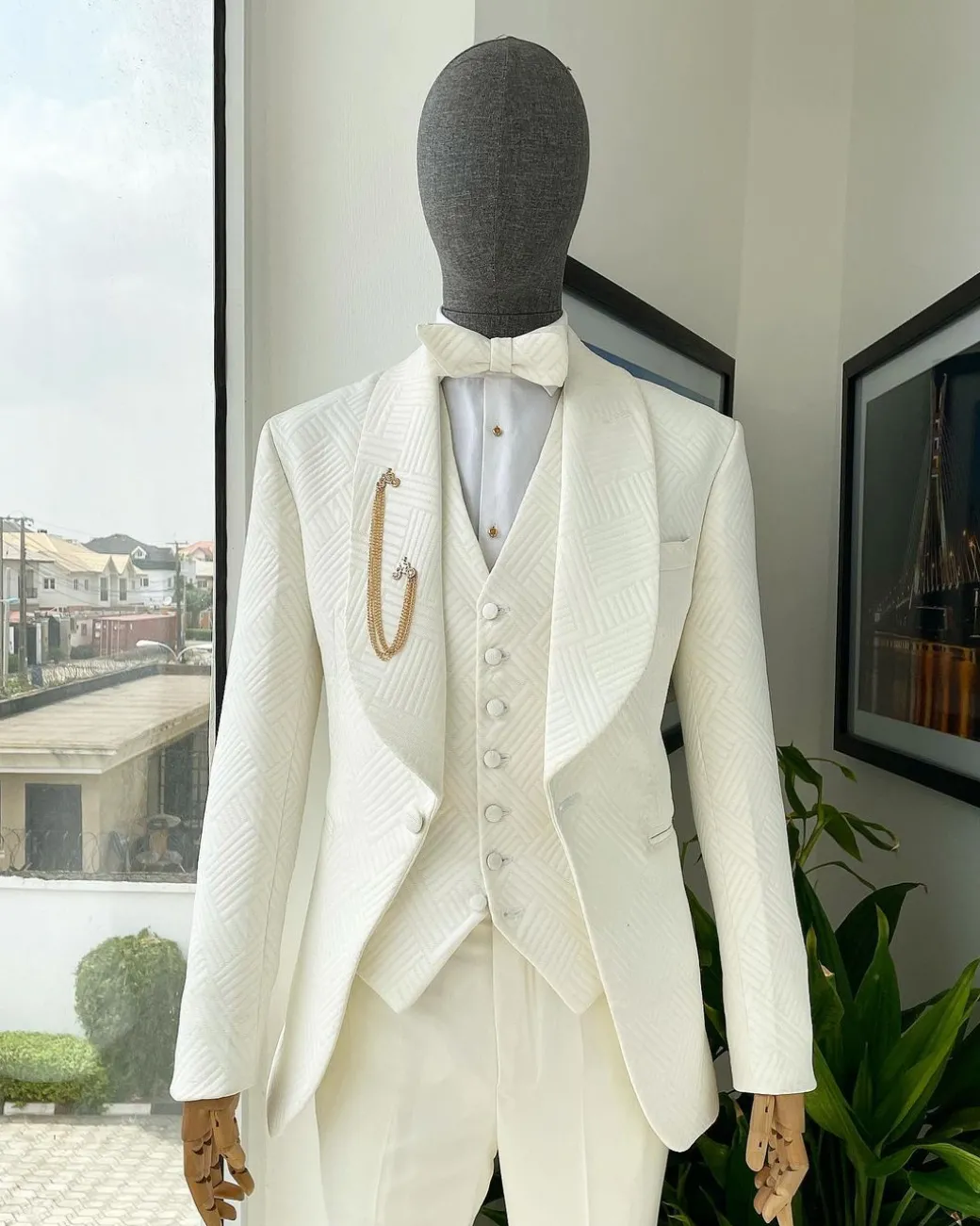 An ivory white, shawl lapel, “maze” line intersection Japanese patterned jacquard suit