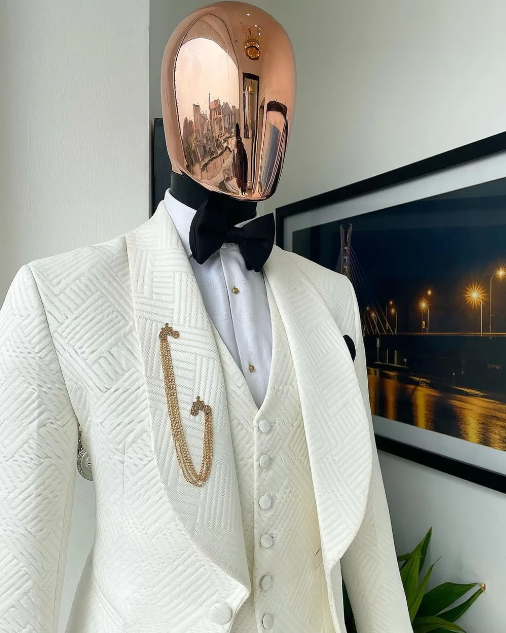 An ivory white, shawl lapel, “maze” line intersection Japanese patterned jacquard suit