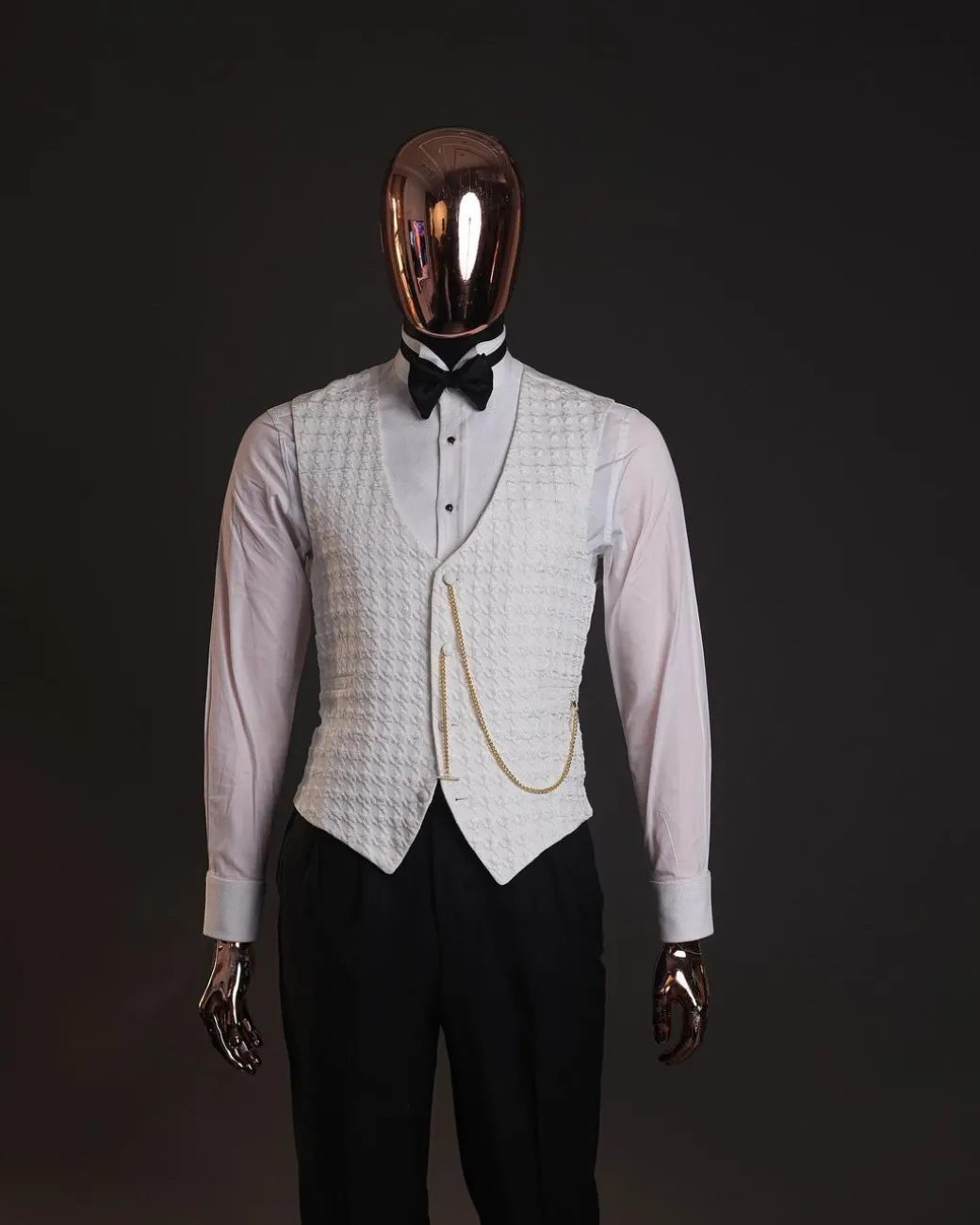 An Ivory white, swollen floral jacquard shawl lapel tuxedo suit
