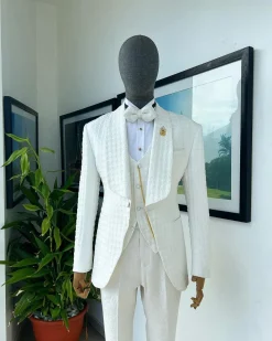 An Ivory white, swollen floral jacquard shawl lapel tuxedo suit.