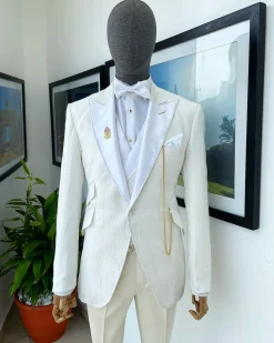 An Ivory white tear drop pattern jacquard hand picked peak lapel Suit.