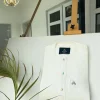 An Ivory white with a matching rainbow-shaded glass button African Kaftan
