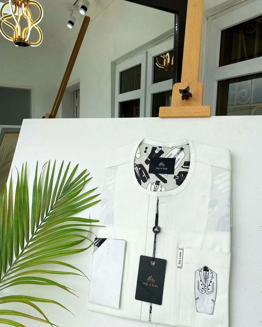An Ivory white with front flap, paisley detailing African Kaftan and sokoto