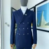 An Navy blue “ibiza” wrap suit with snap buttons detailing