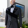 An “octopus” black inverted square patterned jacquard tuxedo with right strap black velvet peak lapel suit