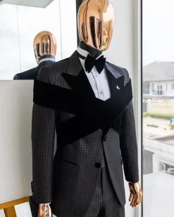 An “Octopus” black inverted square patterned metallic jacquard tuxedo with intersected black velvet peak lapel suit