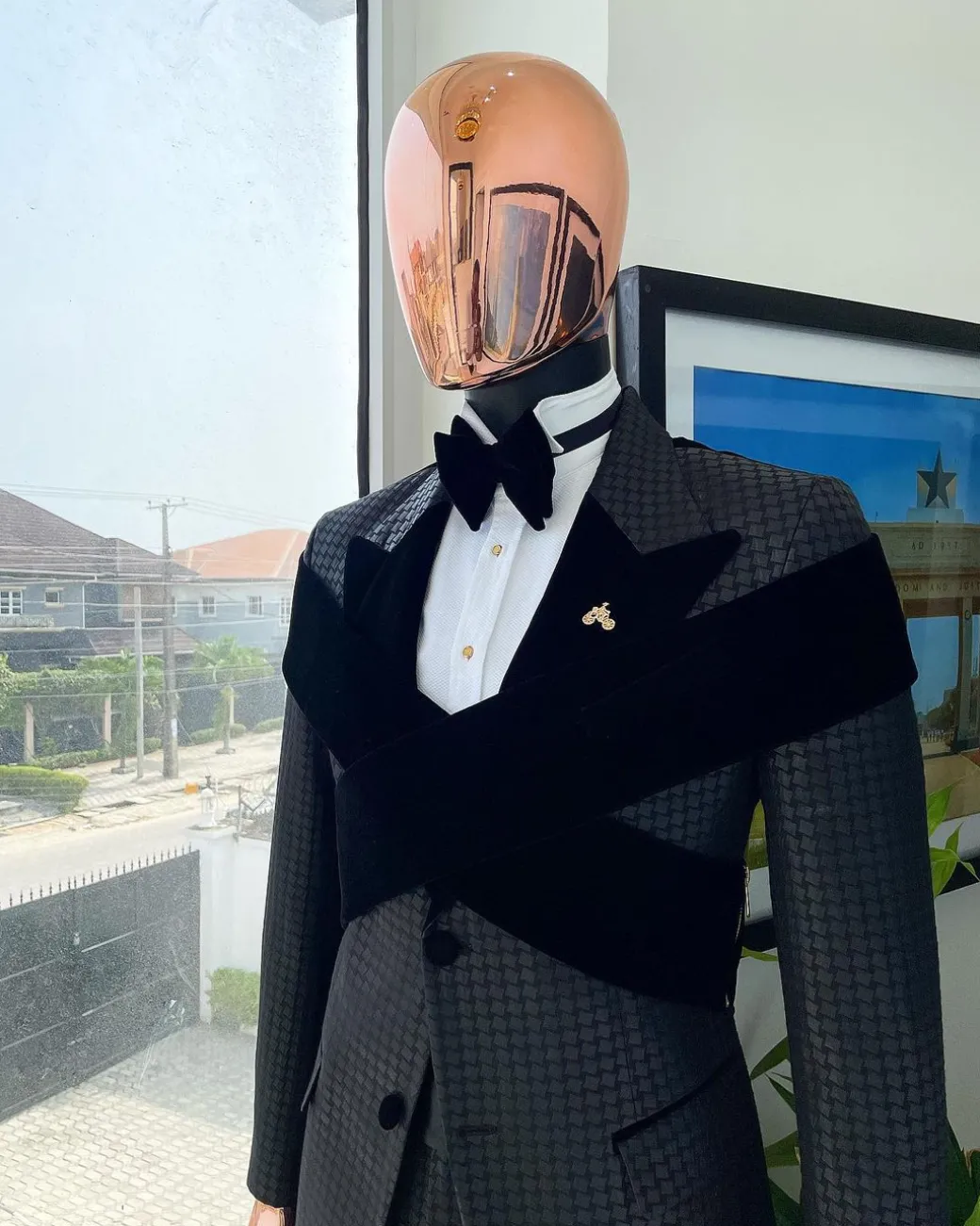 An “Octopus” black inverted square patterned metallic jacquard tuxedo with intersected black velvet peak lapel suit