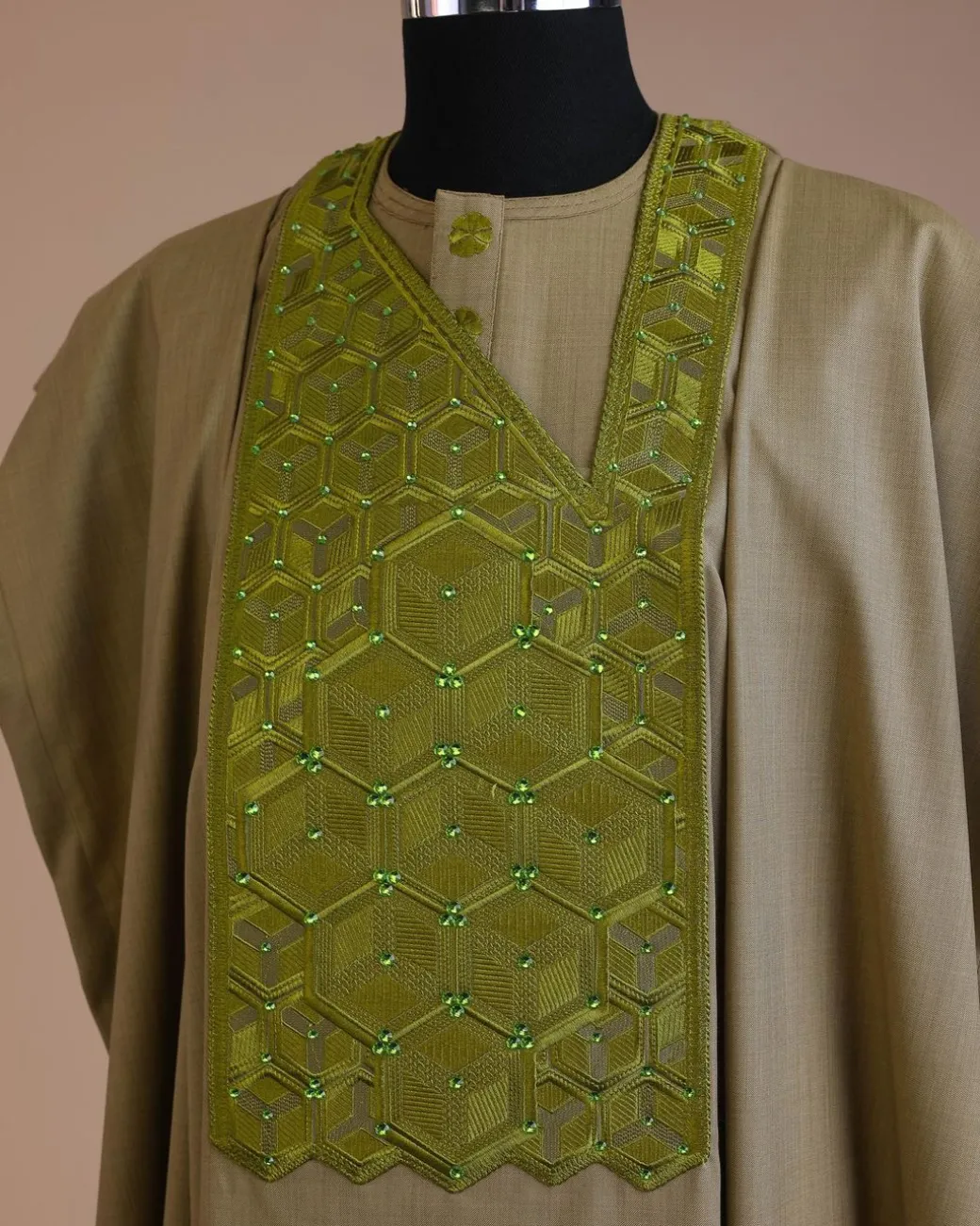 An Olive Green, Connected inverted cube -layered 3D embroidery design with splashed matching green ss30 Swarovski stone details agbada