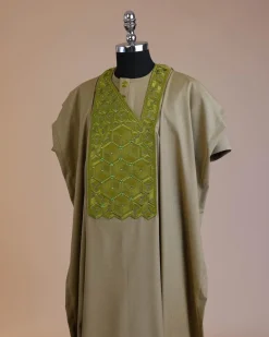 An Olive Green, Connected inverted cube -layered 3D embroidery design with splashed matching green ss30 Swarovski stone details agbada