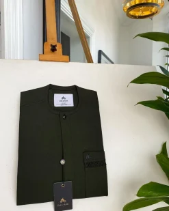 An Olive Green, Tiny Flap with Swarovski button details African traditional senator kaftan native.