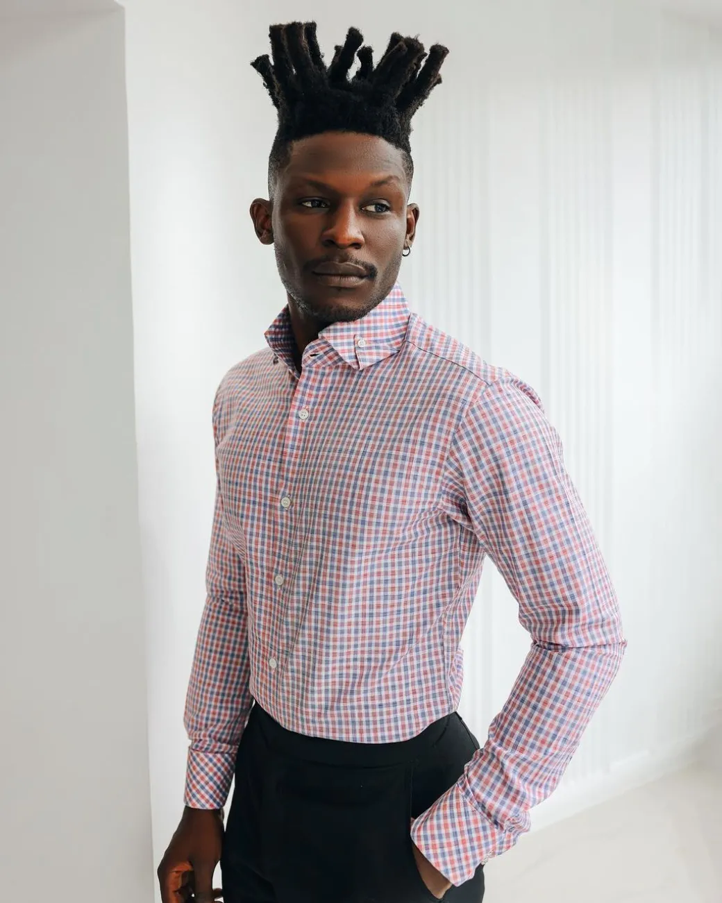 An Orange, blue & white plaid check with a high collar with a turn-up casual shirt.