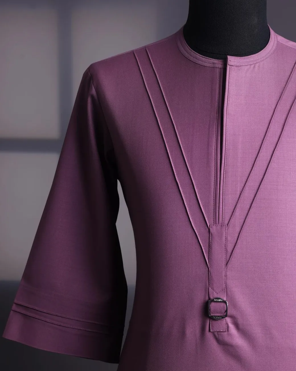 An orchid purple, pleated triangle with buckle intersection, 3/4 sleeve African senator kaftan native.