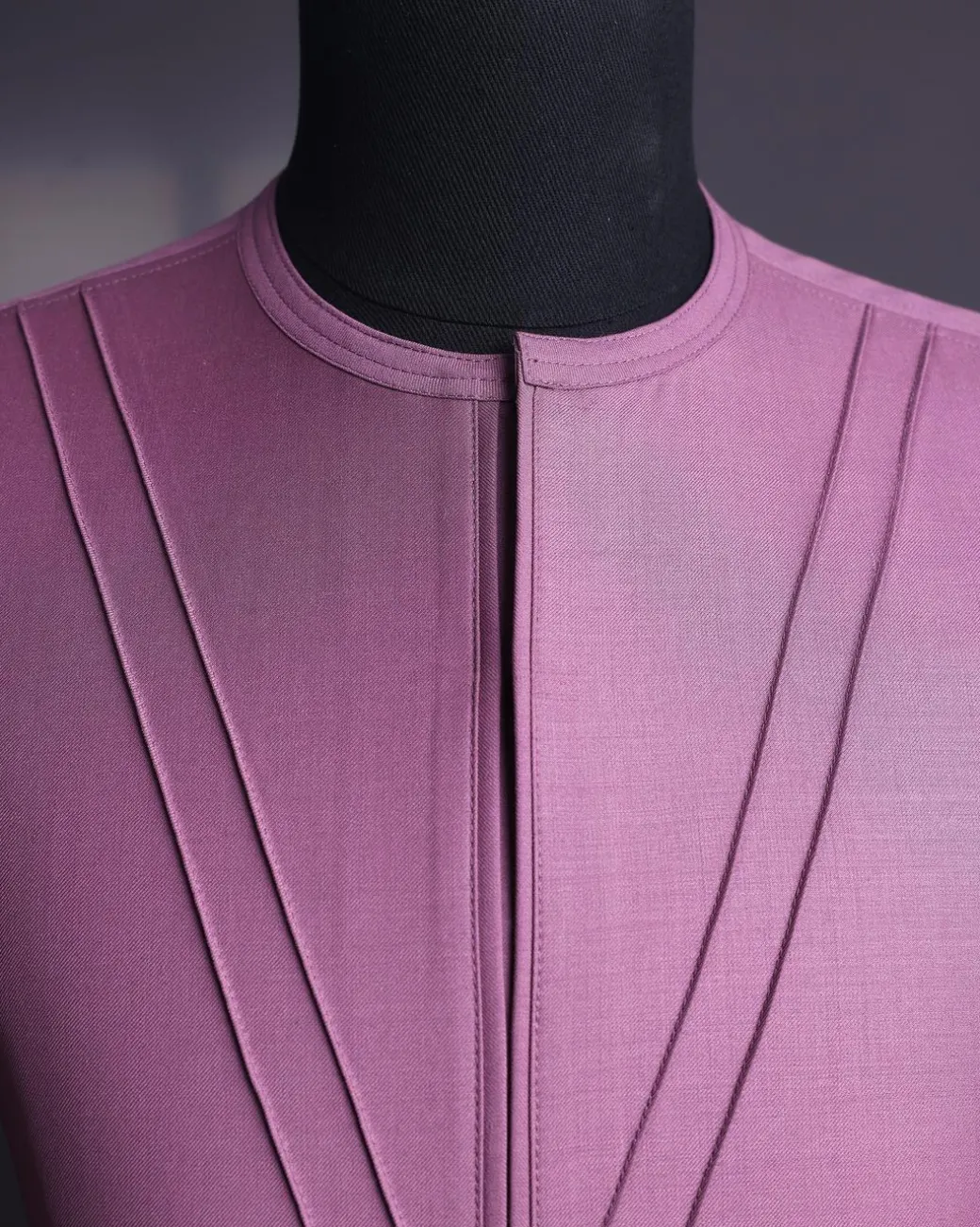 An orchid purple, pleated triangle with buckle intersection, 3/4 sleeve African senator kaftan native.