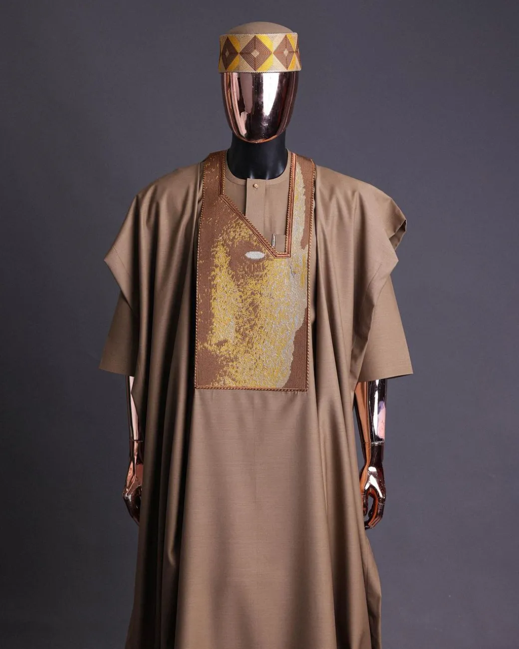 An tortilla Brown, Night walker embroidery details agbada, mixed Swarovski buttons on 3/4 sleeve kaftan & sokoto