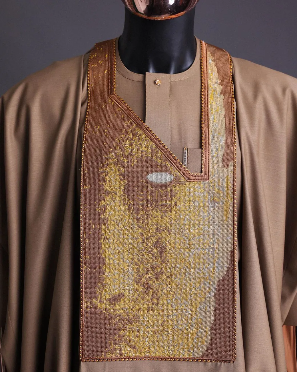 An tortilla Brown, Night walker embroidery details agbada, mixed Swarovski buttons on 3/4 sleeve kaftan & sokoto