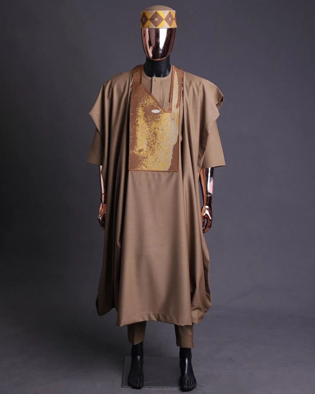 An tortilla Brown, Night walker embroidery details agbada, mixed Swarovski buttons on 3/4 sleeve kaftan & sokoto