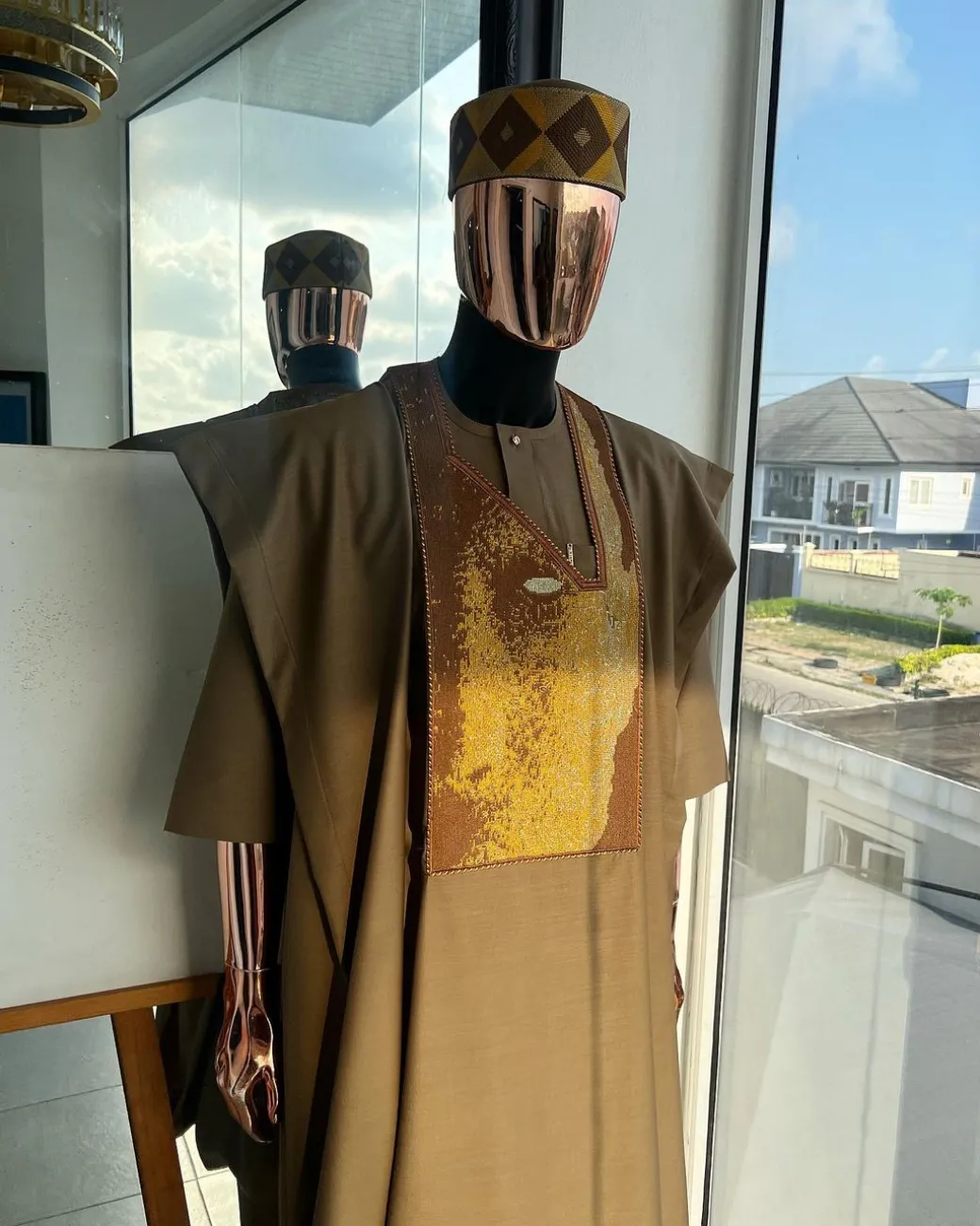 An tortilla Brown, Night walker embroidery details agbada, mixed Swarovski buttons on 3/4 sleeve kaftan & sokoto