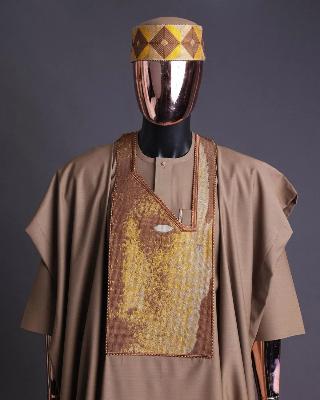 An tortilla Brown, Night walker embroidery details agbada, mixed Swarovski buttons on 3/4 sleeve kaftan & sokoto