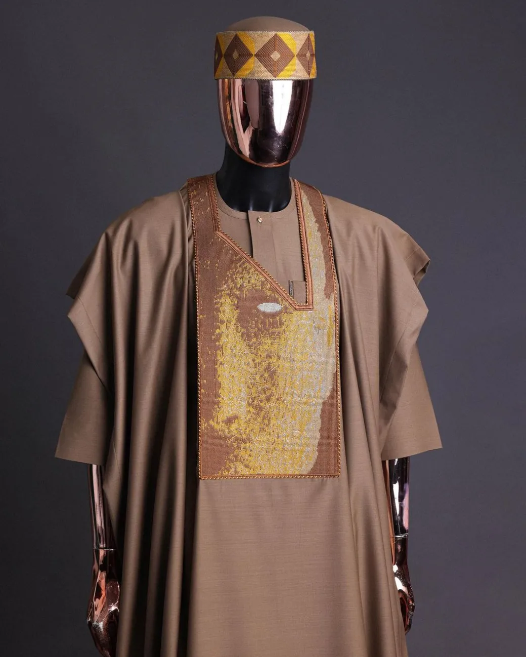 An tortilla Brown, Night walker embroidery details agbada, mixed Swarovski buttons on 3/4 sleeve kaftan & sokoto
